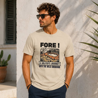 Man wearing a light beige t-shirt with "Fore! A Golfer's Journey Into The Wild Unknown" text.