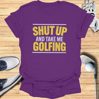 Purple t-shirt with "SHUT UP AND TAKE ME GOLFING" text, golf shoes, and ball.