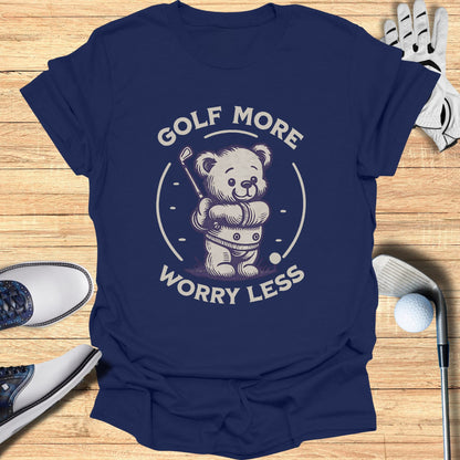 Navy t-shirt with a cartoon teddy bear playing golf graphic.