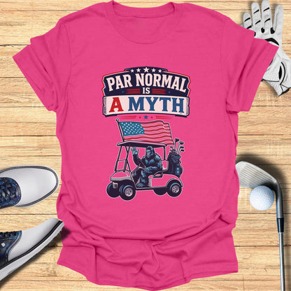 Pink t-shirt with graphic of gorilla in golf cart, "Par Normal is a Myth" text.