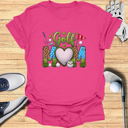 Pink t-shirt with "Golf Mom" text and golf-themed graphics.