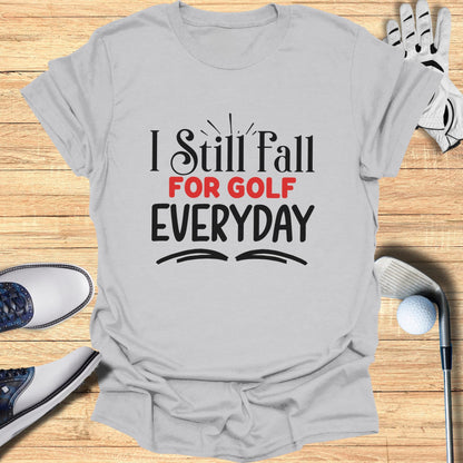 Gray t-shirt with "I Still Fall FOR GOLF EVERYDAY" text.