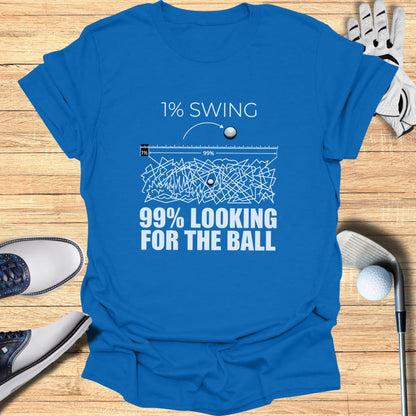 Blue t-shirt with "1% SWING 99% LOOKING FOR THE BALL" text and golf elements.