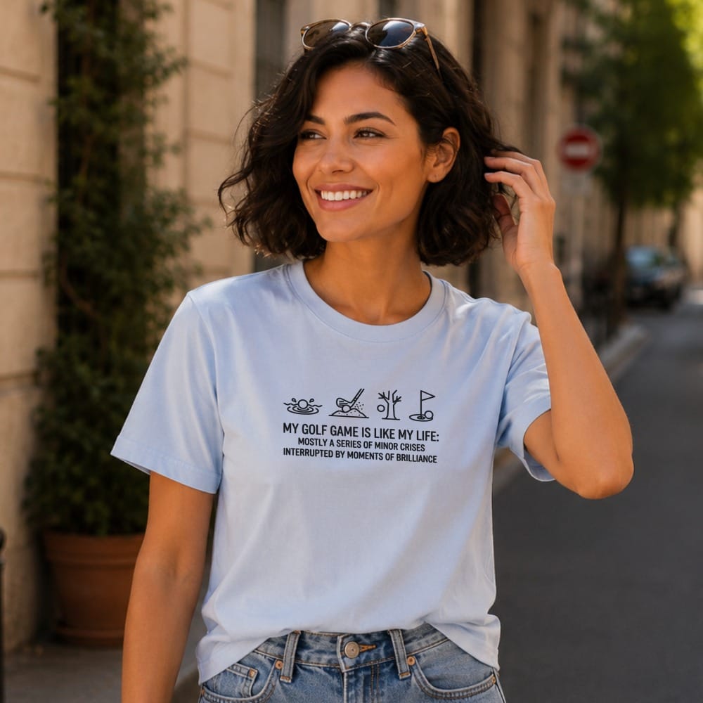 Light blue t-shirt with black golf-themed graphic and text about golf.