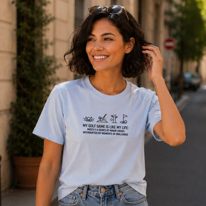 Light blue t-shirt with black golf-themed graphic and text about golf.