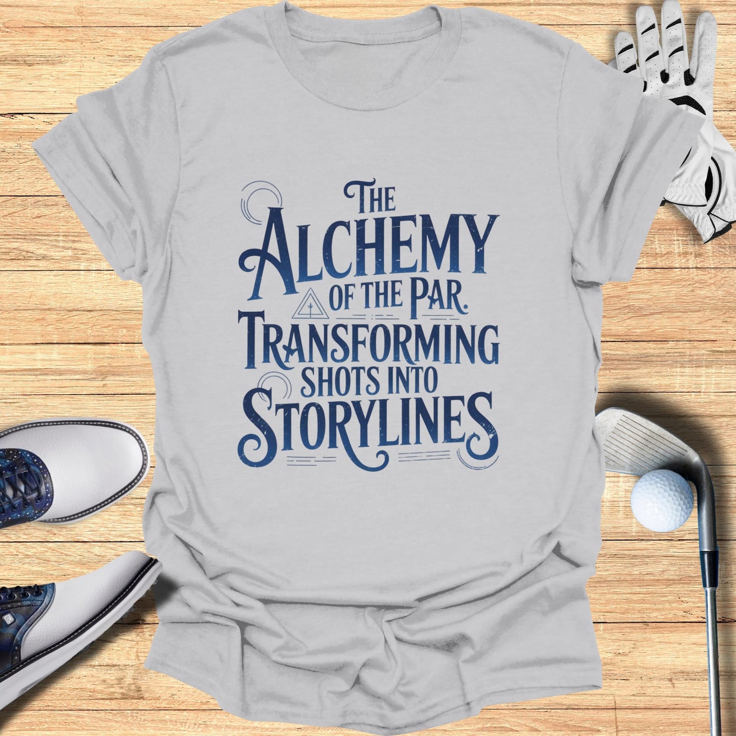 Grey t-shirt with "The Alchemy of the Par Transforming Shotlines" text.