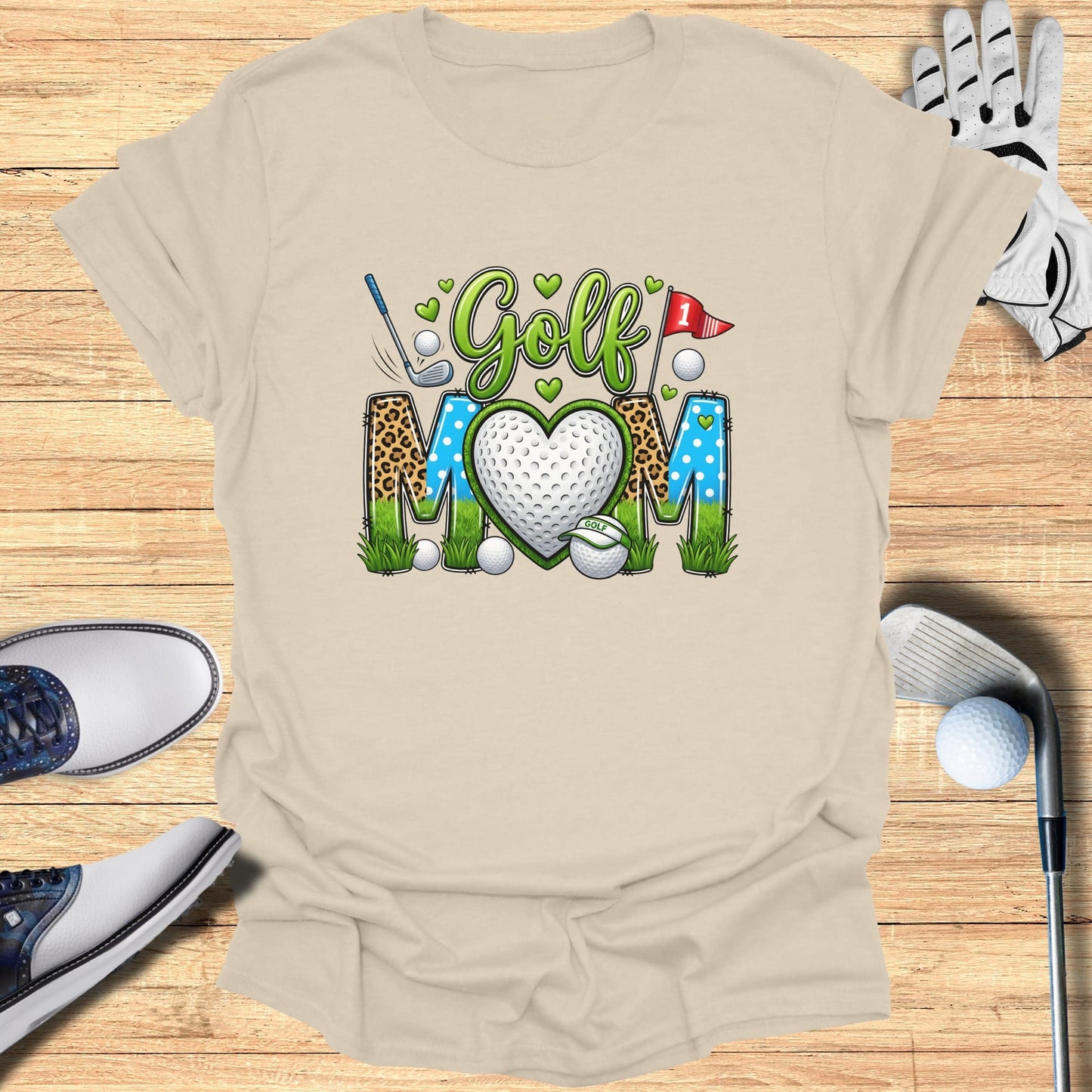 Golf Mom heart graphic with golf clubs, ball, and heart shape.