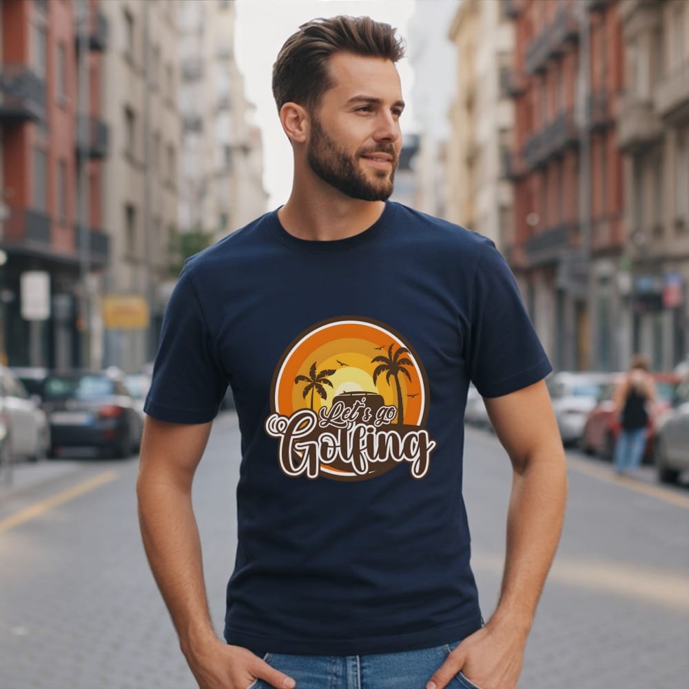 Man wearing navy t-shirt with "Let's Go Golfing" sunset graphic.