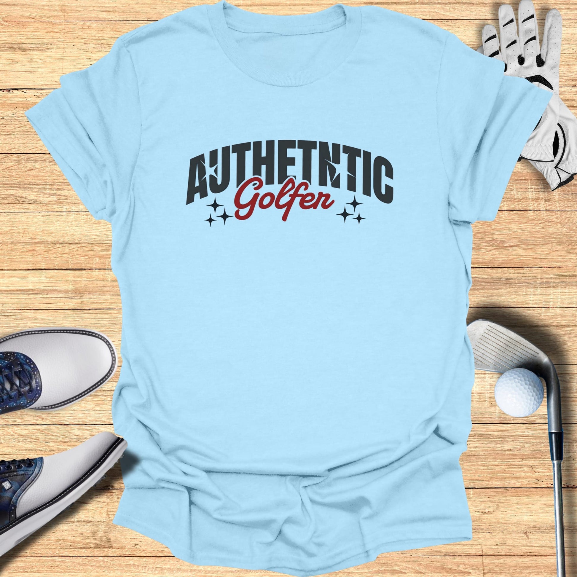 Light blue t-shirt with "Authentic Golfer" text and golf accessories.