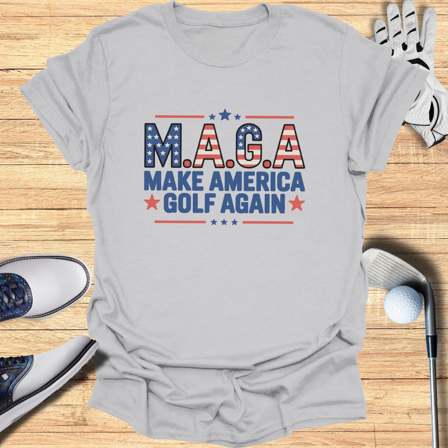 T-shirt with "M.A.G.A. Make America Golf Again" text, golf clubs, and balls.
