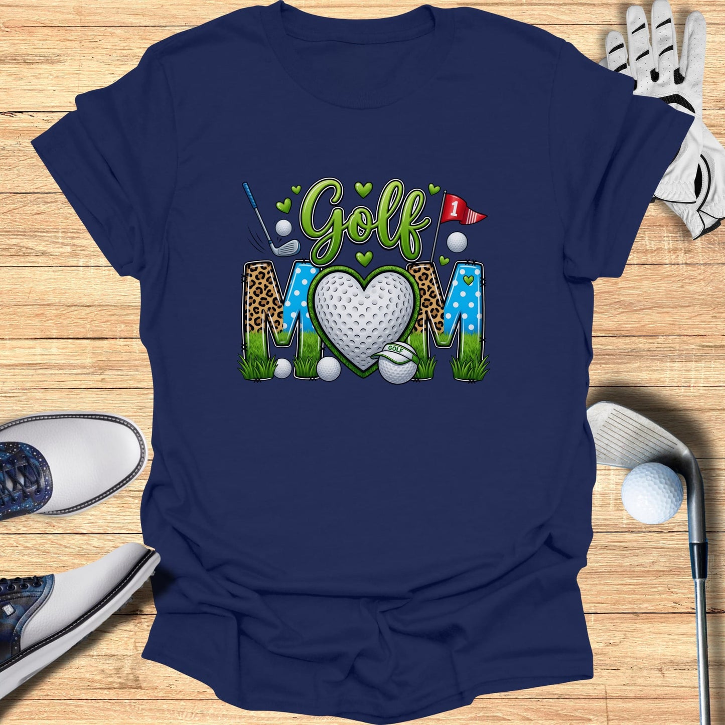 Navy t-shirt with "Golf Mom" text, golf ball heart, and clubs.