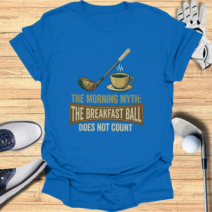 Blue t-shirt with golf club and coffee mug graphic reading "The Morning Myth: Does Not Count".