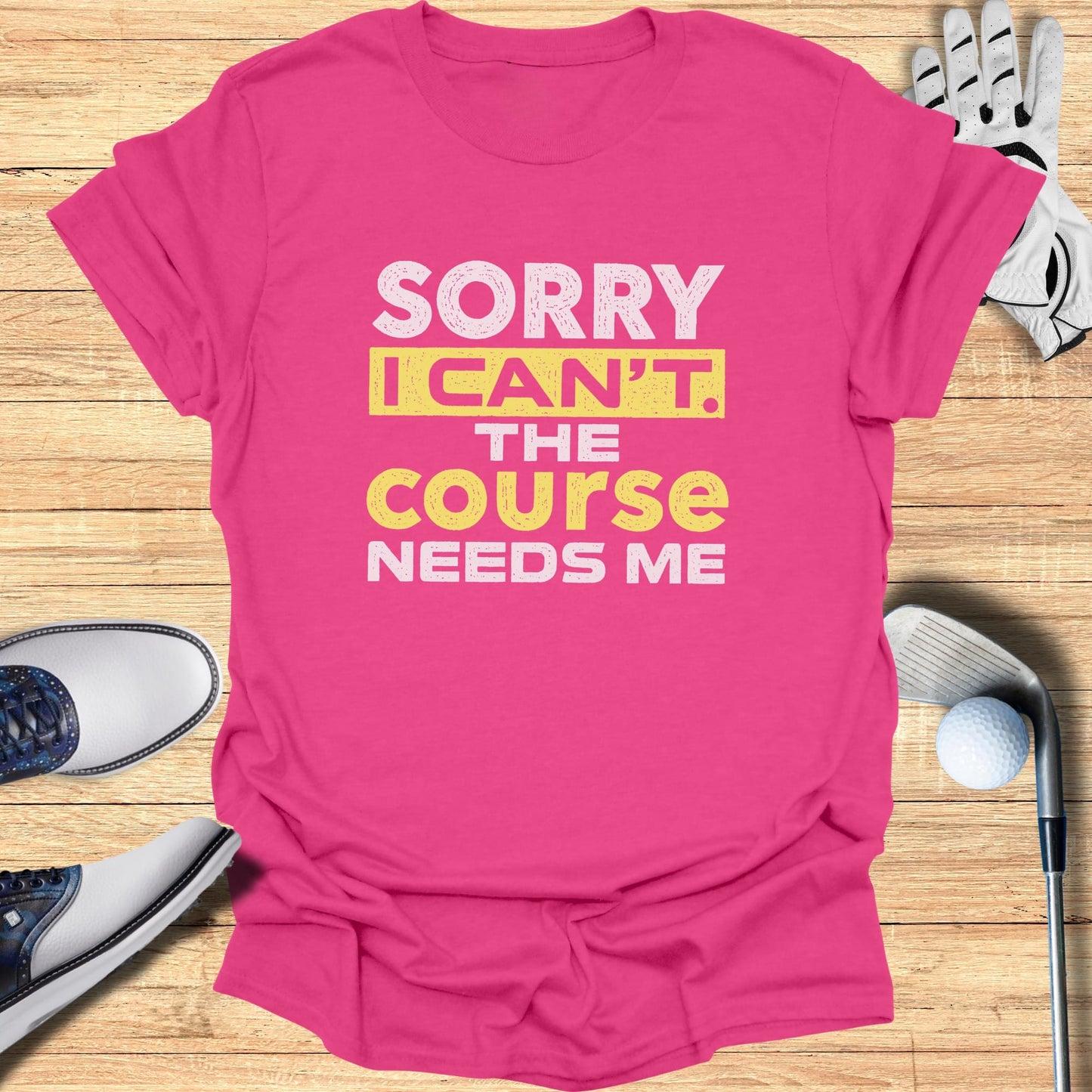 Pink t-shirt with yellow text reading "Sorry I can't. The course needs me."