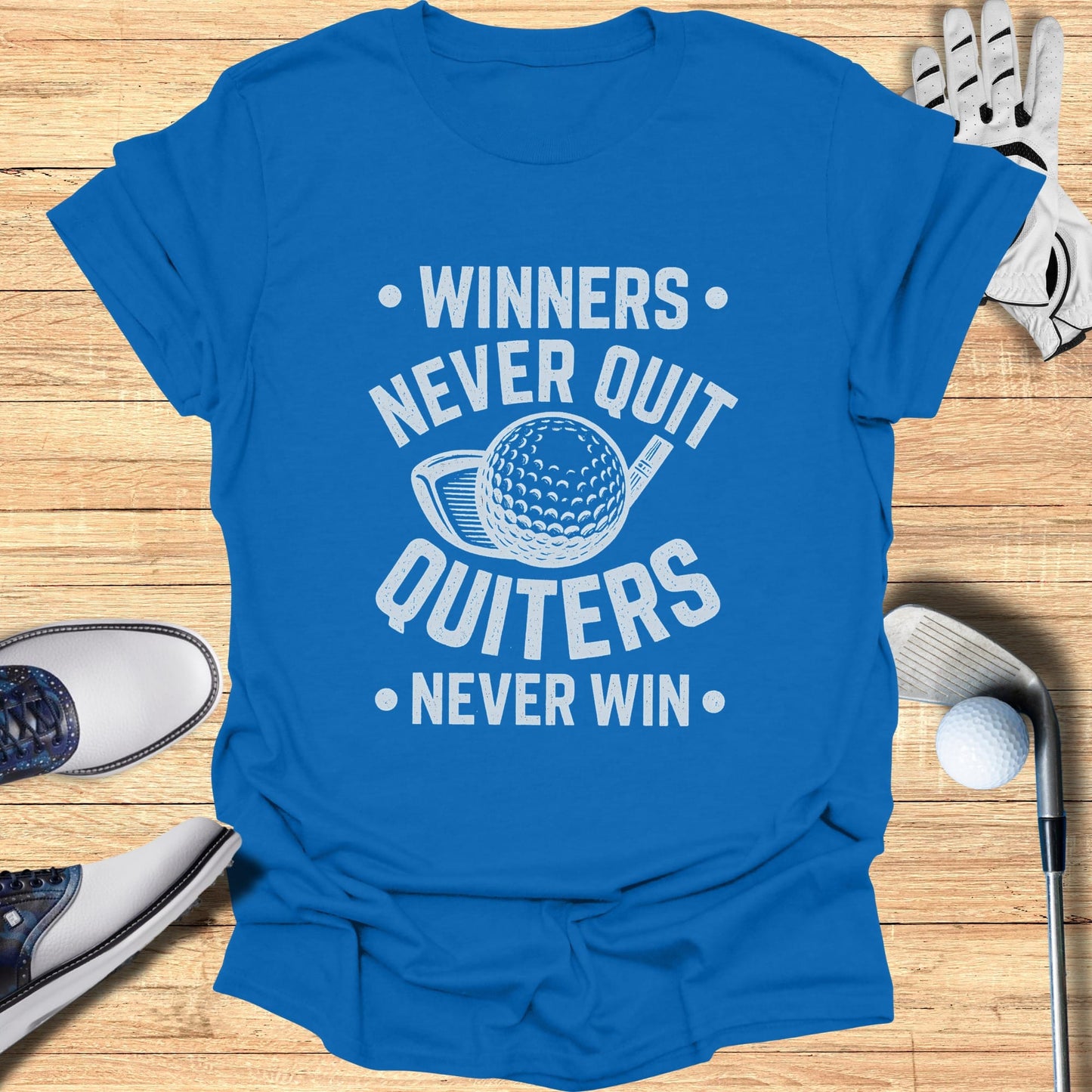 Blue t-shirt with white text "Winners never quit, quitters never win".