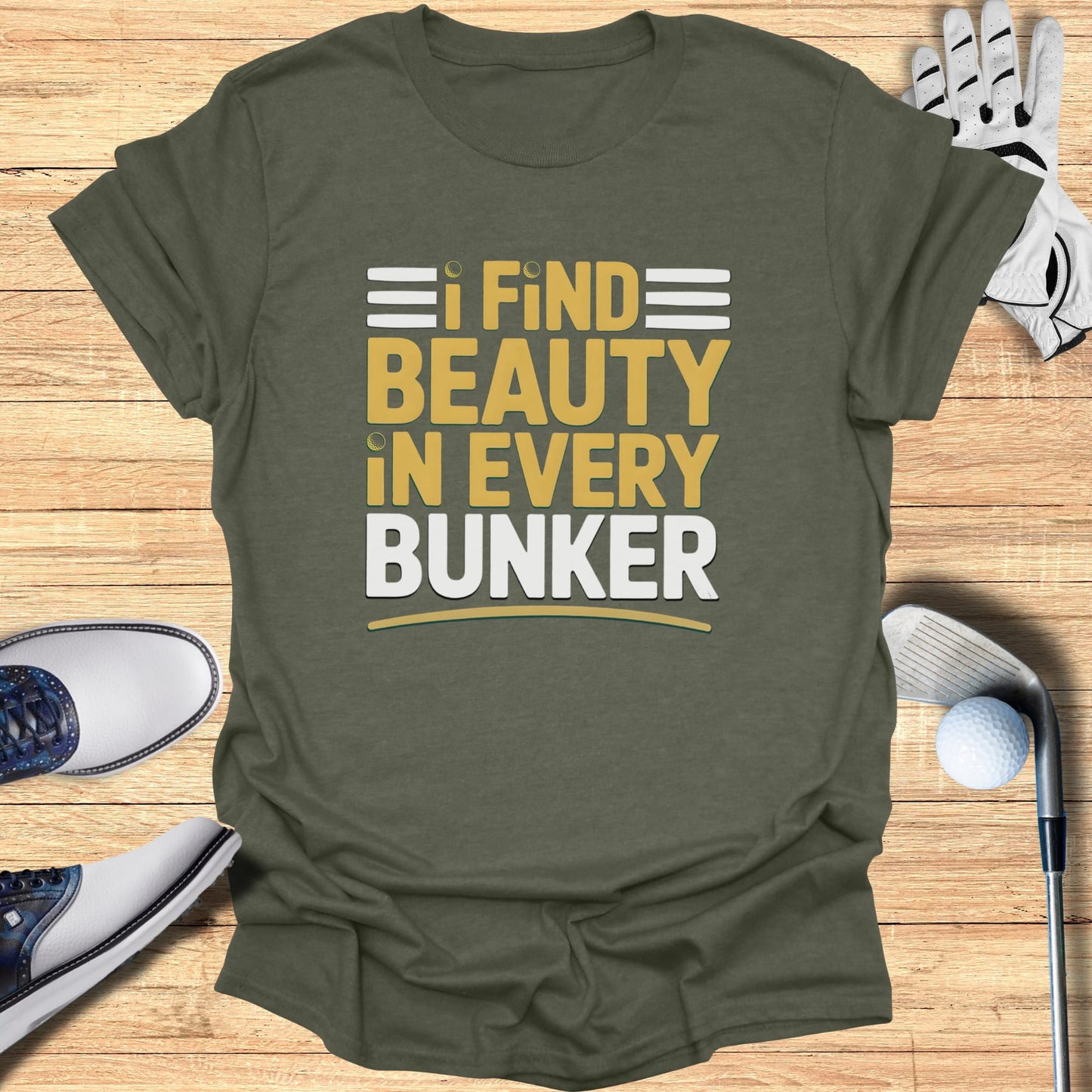 Olive green t-shirt with "I FIND BEAUTY IN EVERY BUNKER" text in yellow and white.