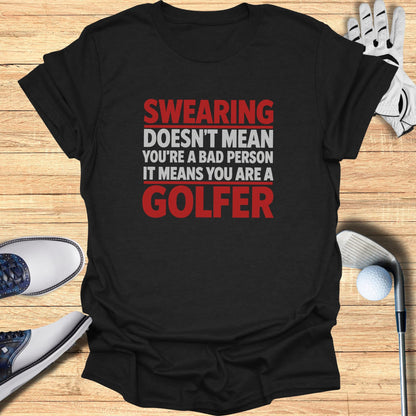 Black t-shirt with white and red text reading "SWEARING DOESN'T MEAN YOU'RE A BAD PERSON IT MEANS YOU ARE A GOLFER".