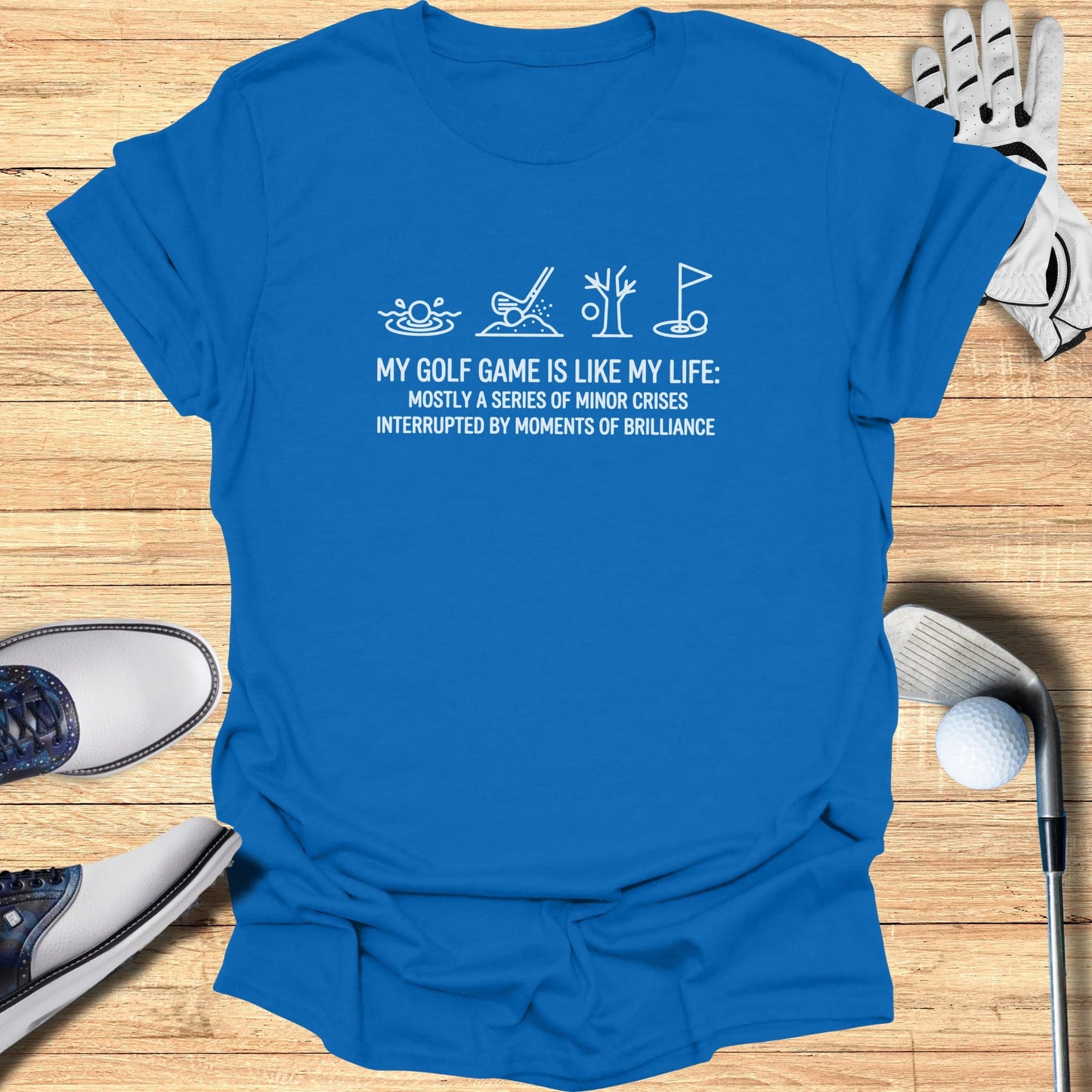 Blue t-shirt with text about golf and life.