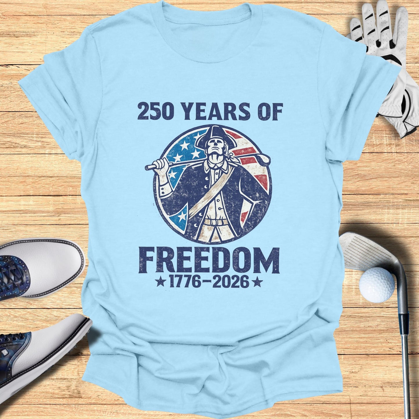 Light blue t-shirt with "250 Years of Freedom 1776-2026" text and colonial graphic.