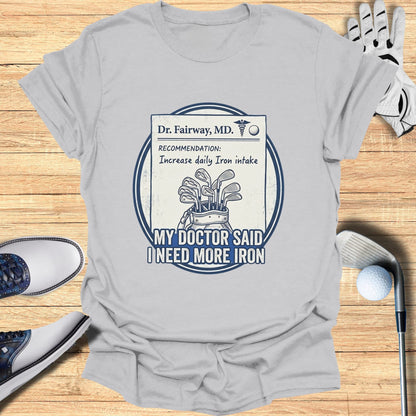 T-shirt with "Dr. Fairway, MD. RECOMMENDATION: Increase daily Iron intake MY DOCTOR SAID I NEED MORE IRON" and golf clubs.