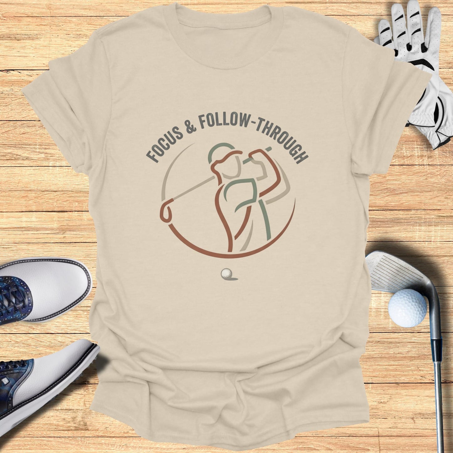 T-shirt with golfer graphic and "FOCUS & FOLLOW-THROUGH" text.