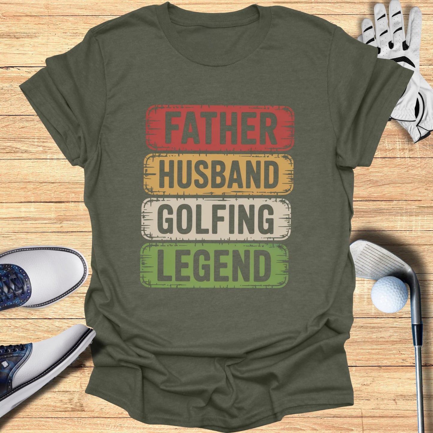 Green t-shirt with \"FATHER HUSBAND GOLFING LEGEND\" text.