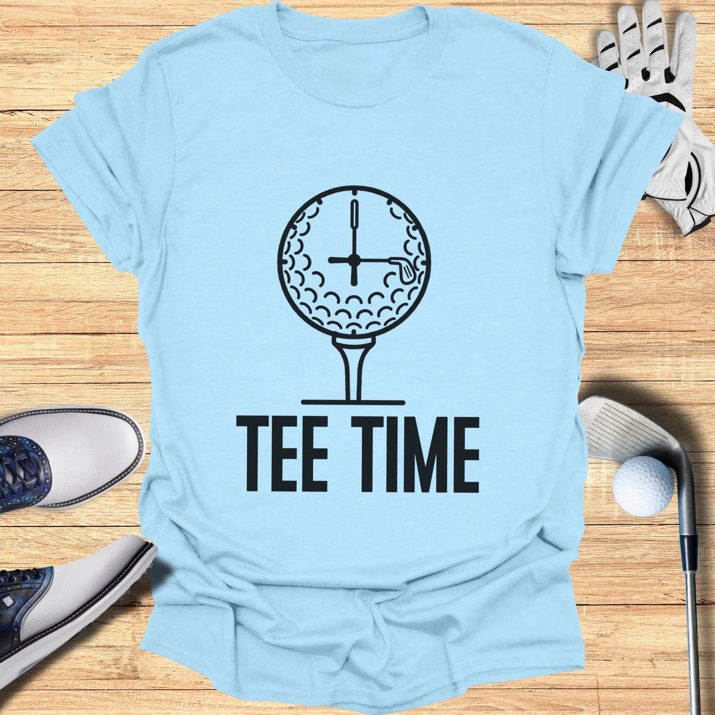 Light blue t-shirt with a clock on a golf ball and "TEE TIME" text.