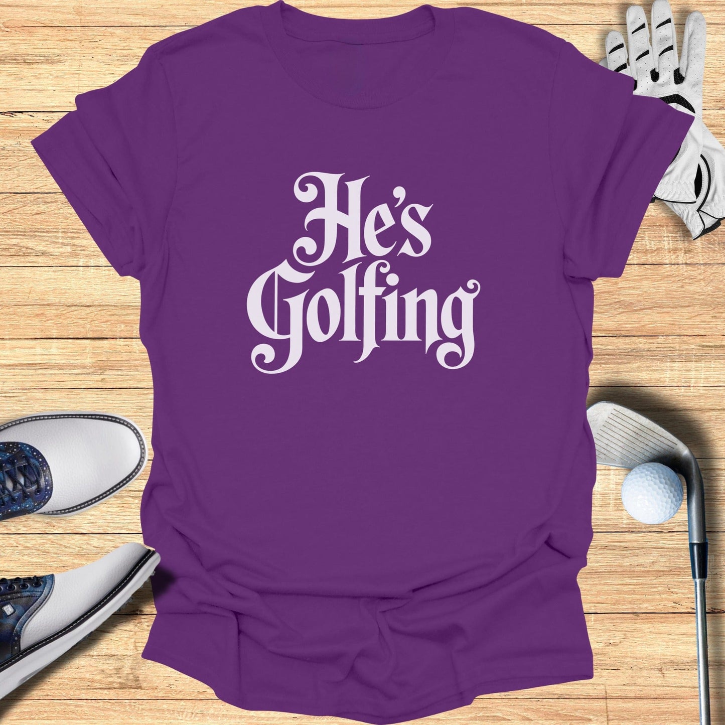 He's Golfing Purple Short Sleeve Graphic Tee