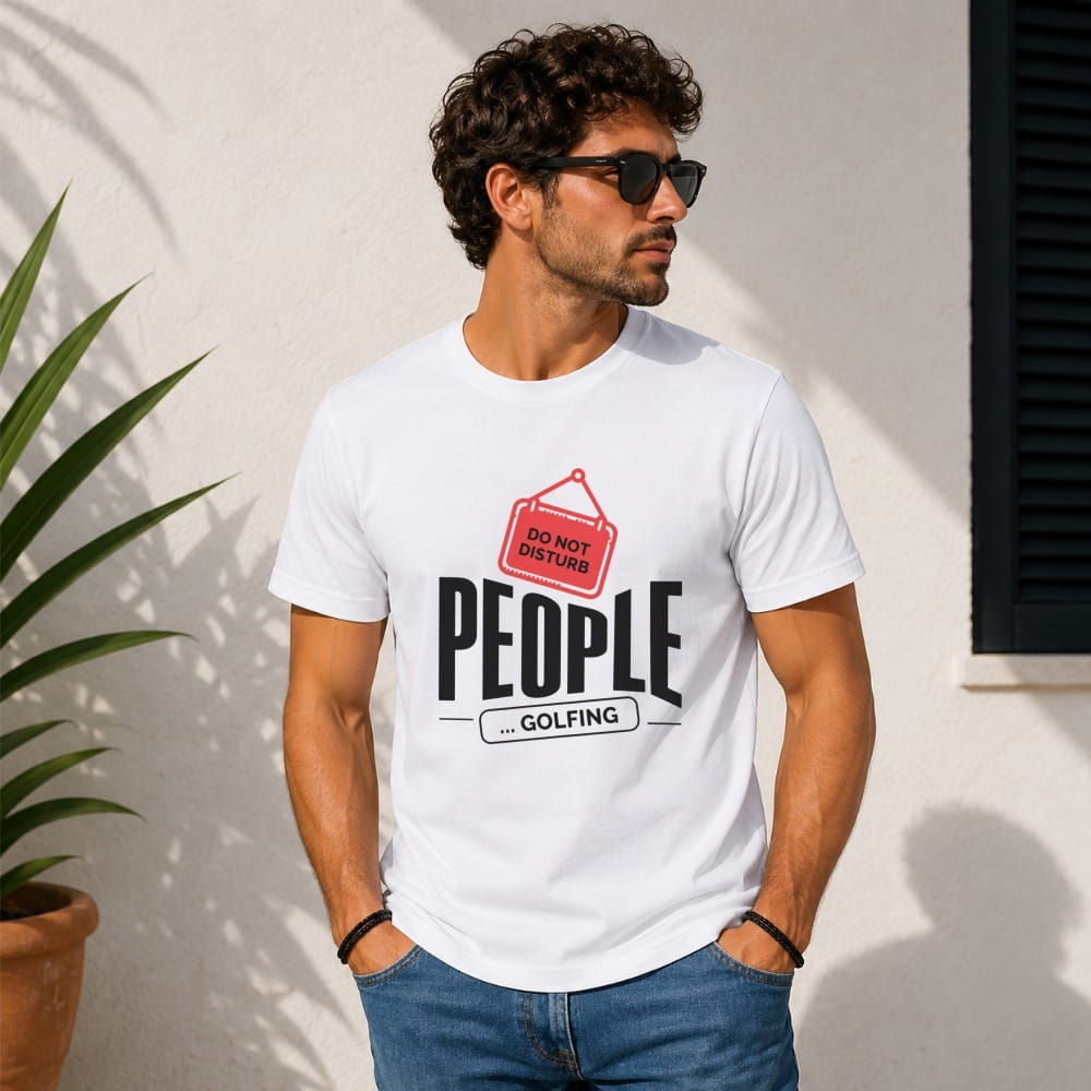 White t-shirt with "DO NOT DISTURB ... GOLFING" text and golf club graphic.