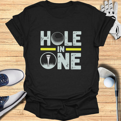 Black t-shirt with "HOLE IN ONE" text and golf ball graphic.