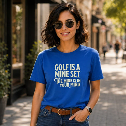 Woman wearing a blue t-shirt with "Golf is a mine set, the mine is in your mind" text.
