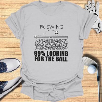T-shirt with "1% SWING 99% LOOKING FOR THE BALL" text.