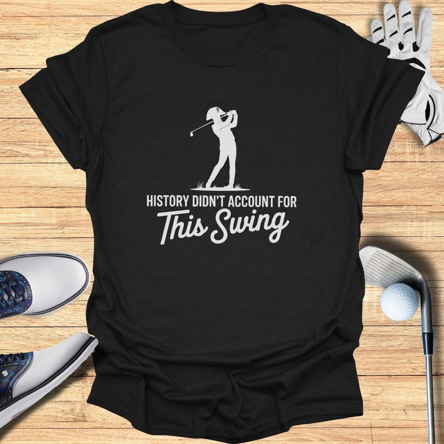 Black t-shirt with "History didn't account for This Swing" and a golfer silhouette.