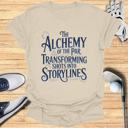 Cream t-shirt with "The Alchemy of the Par" and "Shots into Storylines" text.