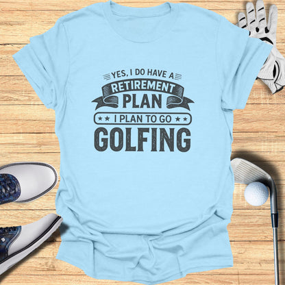 Light blue t-shirt with "Retirement Plan I Plan to Go Golfing" text.