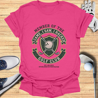 Pink t-shirt with "Member of the Golf Club, I Came, I Saw, I Hacked" slogan.