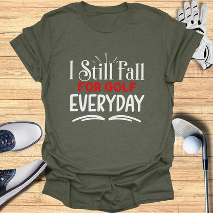 Olive green t-shirt with white text "I Still Fall for Golf Everyday."