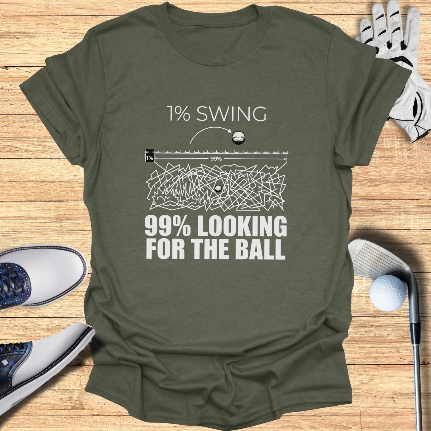 T-shirt with "1% SWING 99% LOOKING FOR THE BALL" text.