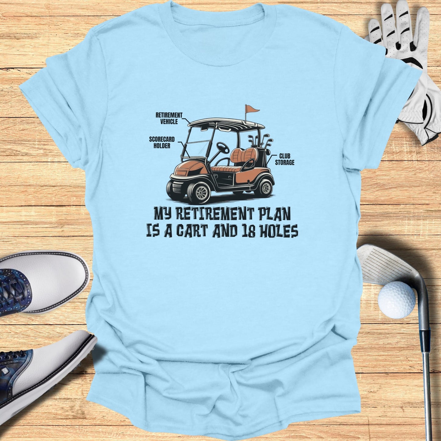 Light blue t-shirt with golf cart graphic and text: My Retirement Plan is a Cart and 18 Holes.