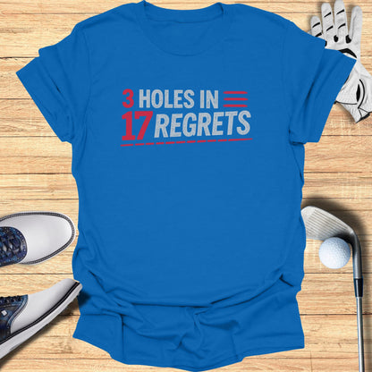 Blue t-shirt with "3 HOLES IN 17 REGRETS" text.