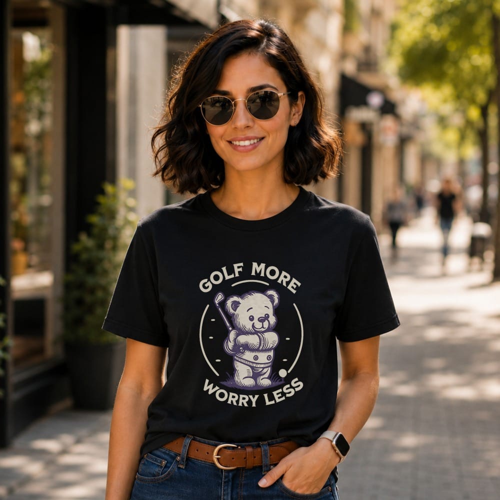 Black t-shirt with bear golfing graphic and "Golf More Worry Less" text.