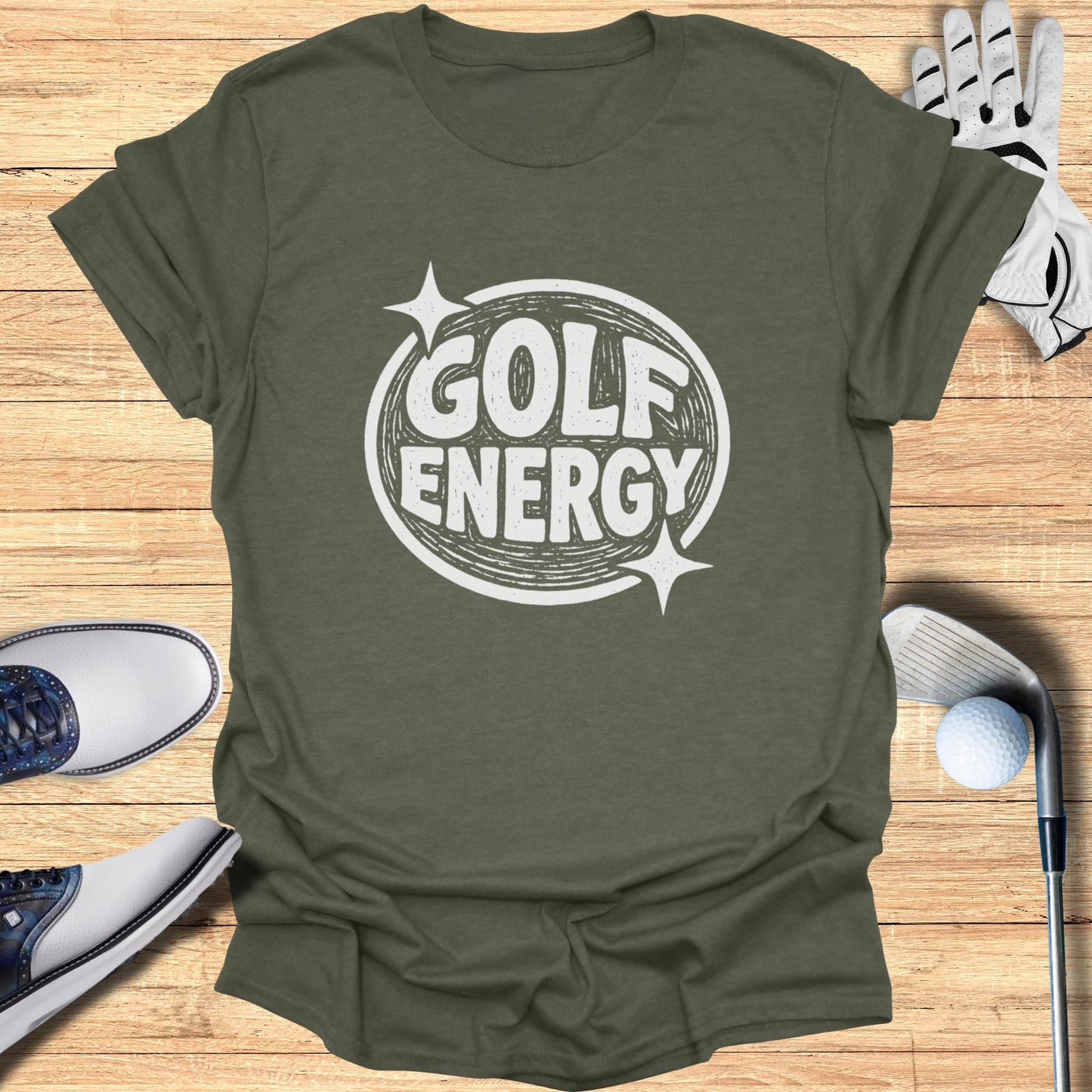 Green t-shirt with "GOLF ENERGY" text inside a circle, surrounded by golf accessories.