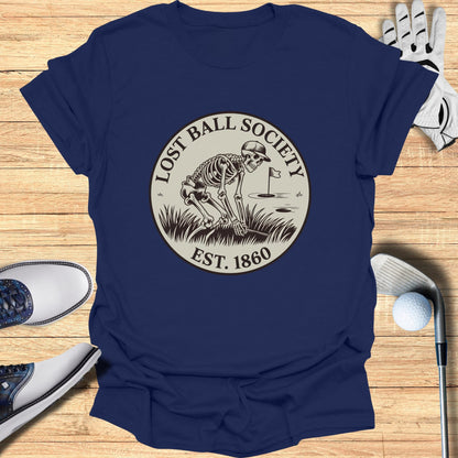 Navy t-shirt with a circular graphic of a skeleton playing golf, "Lost Ball Society Est. 1860".