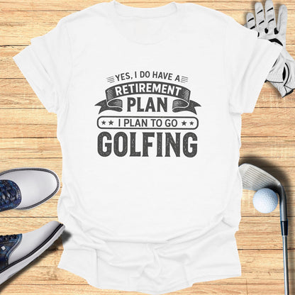 White t-shirt with "YES, I DO HAVE A RETIREMENT PLAN I PLAN TO GO GOLFING" text.