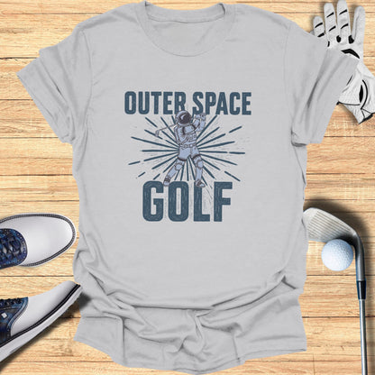 T-shirt with "Outer Space Golf" text and astronaut swinging a golf club.