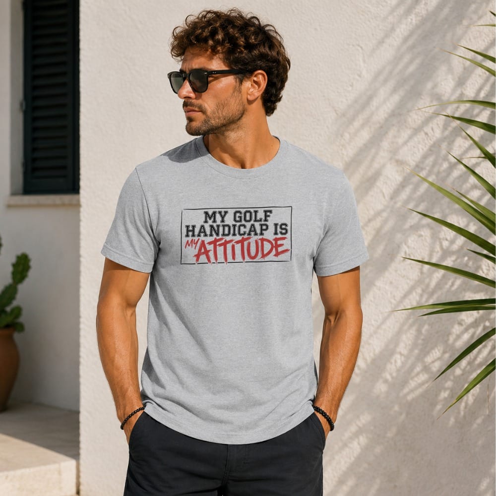 Grey t-shirt with "MY GOLF HANDICAP IS MY ATTITUDE" printed in black and red.