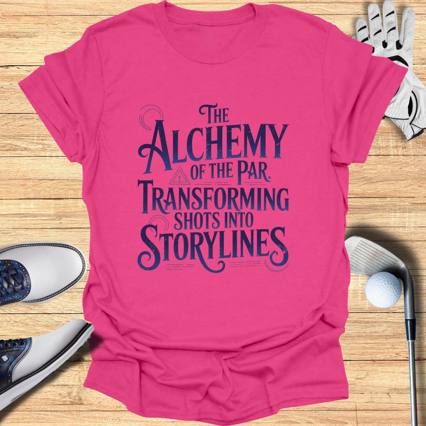 Pink t-shirt with "The Alchemy of the Par Transforming Storylines" printed in blue.
