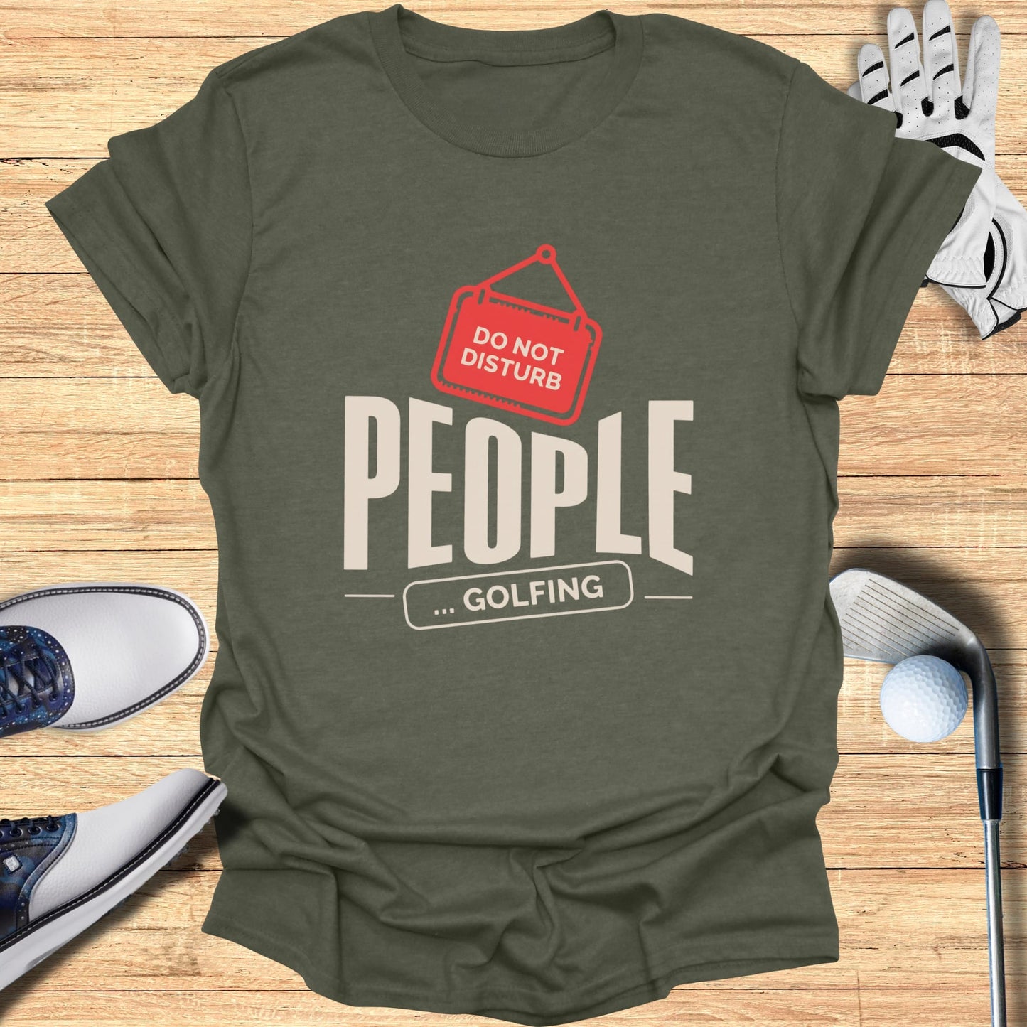 Olive green t-shirt with "DO NOT DISTURB ... GOLFING" graphic.