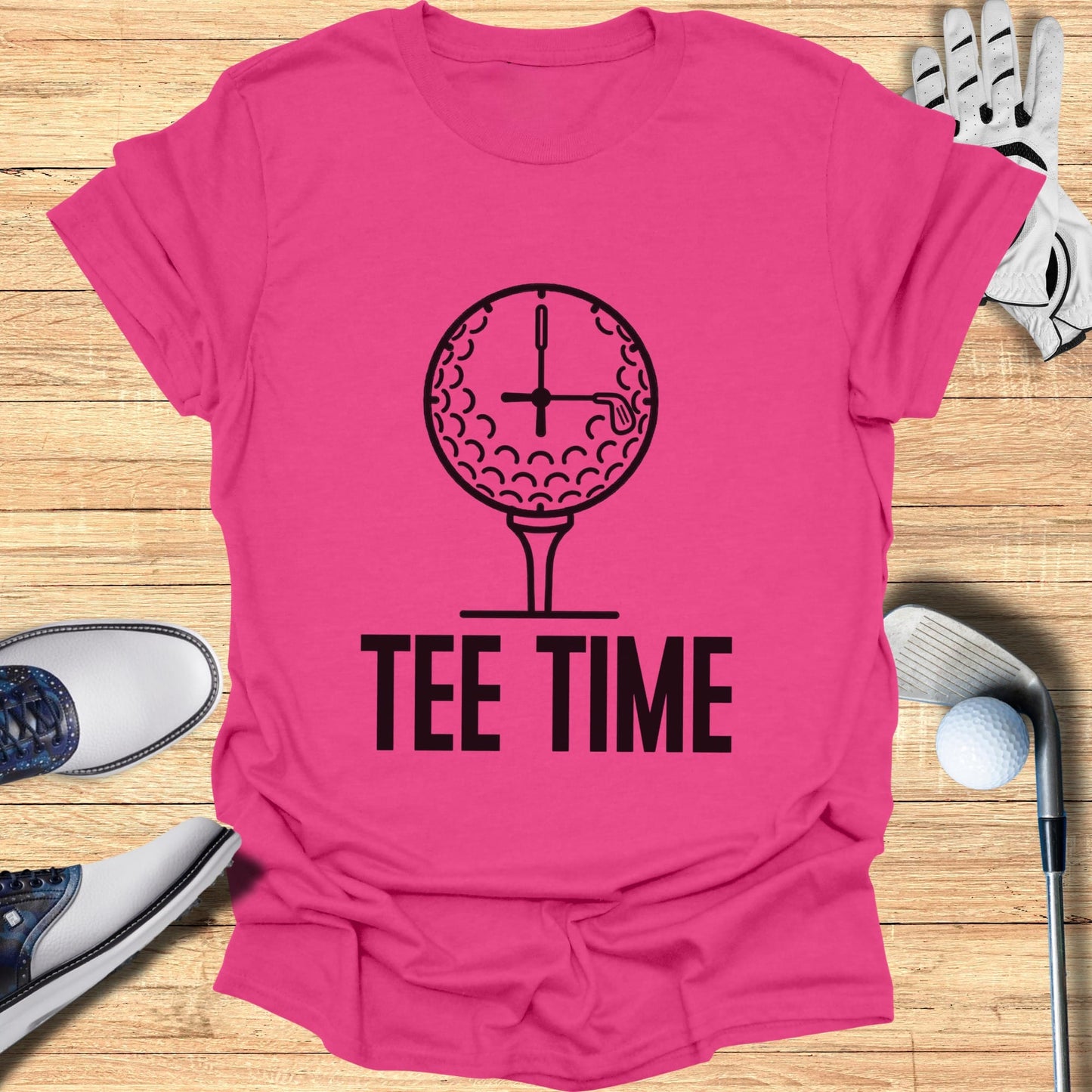 Pink t-shirt with a golf ball clock and "TEE TIME" text.