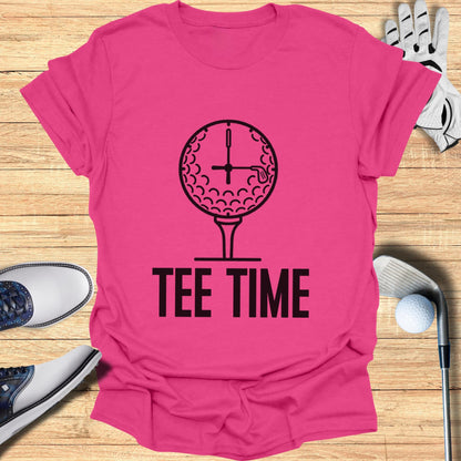 Pink t-shirt with a golf ball clock and "TEE TIME" text.