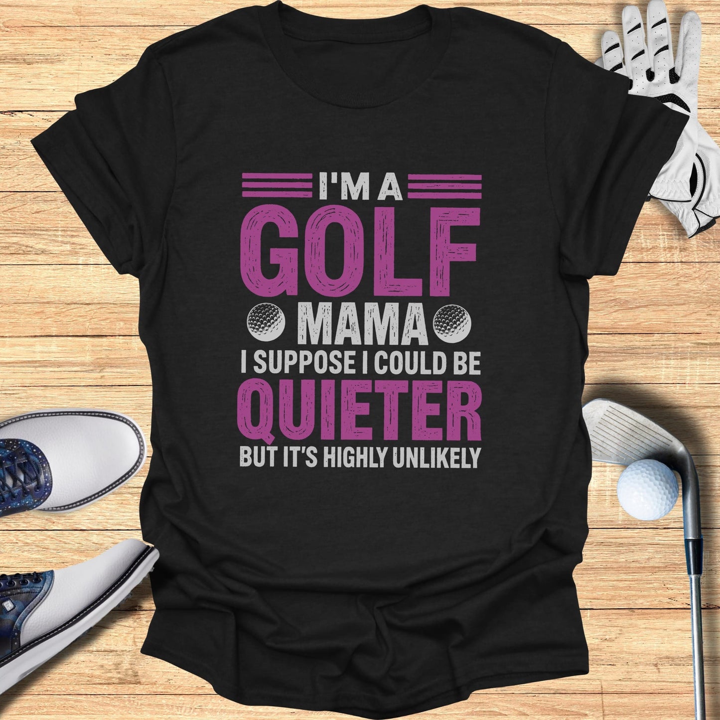 Black t-shirt with "I'm a golf mama, I suppose but it's highly unlikely" text.
